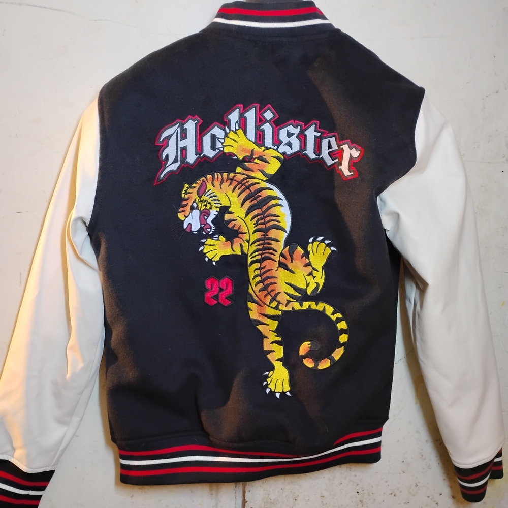 Hollister Black and White Varsity Jacket with Tiger Design